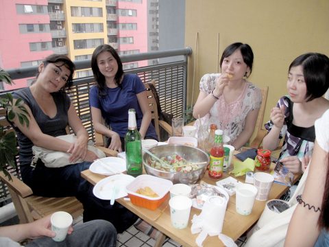 Group of people having breakfast at the LTL Beijing terrace