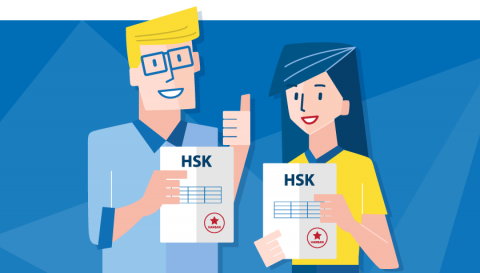 two students holding up their HSK diplomas