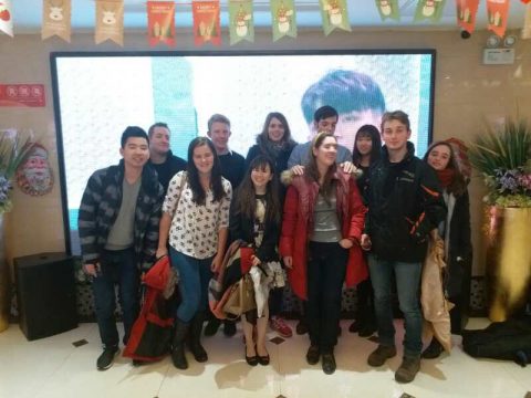 Georgia and other students in front of a huge screen
