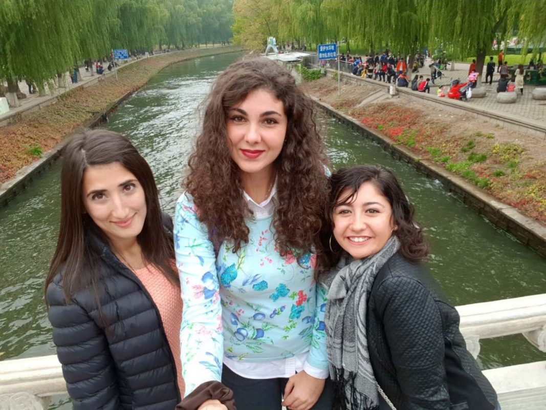 Francesca and two friends selfie on a bridge 